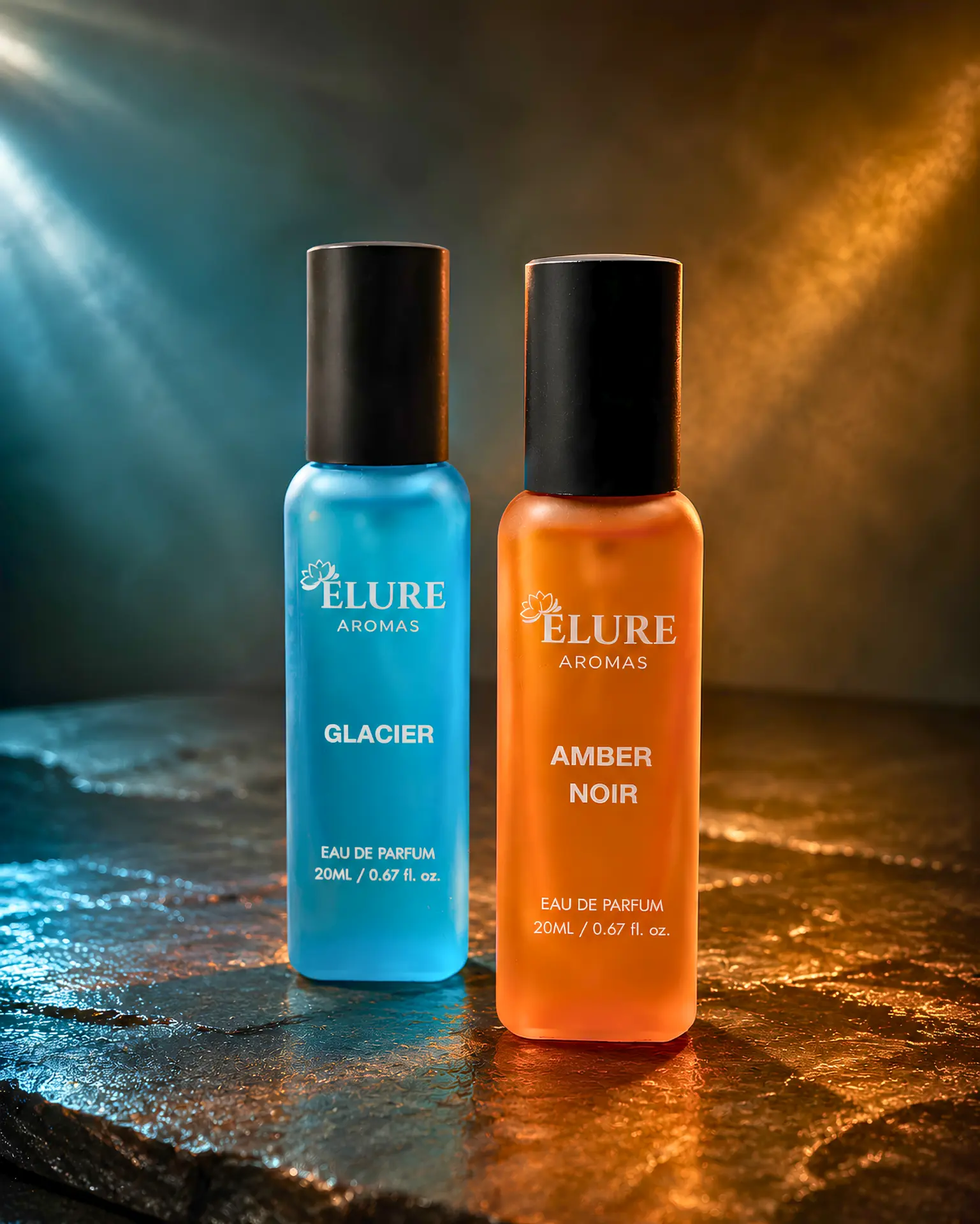 Voyage - Glacier and Amber Noir 20ml bottles in low warm light